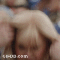 Blurry Woman With Man's Arm Behind Her GIF