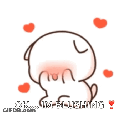 Blushing Cartoon Character With Hearts GIF