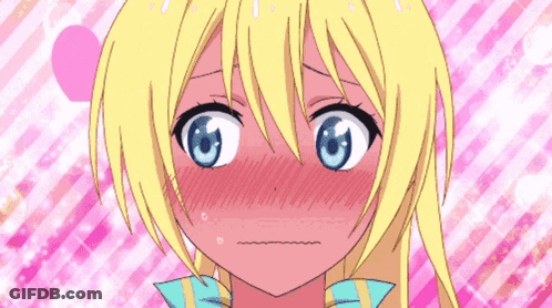 Blushing Girl With Blonde Hair And Blue Eyes GIF