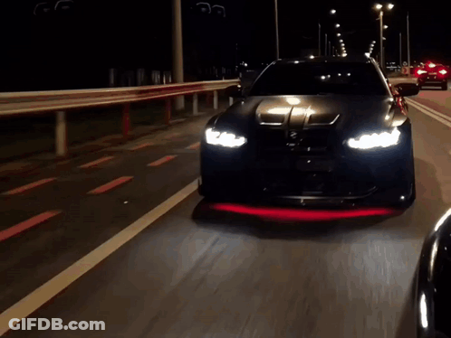BMW Driving At Night With Red Front Light GIF