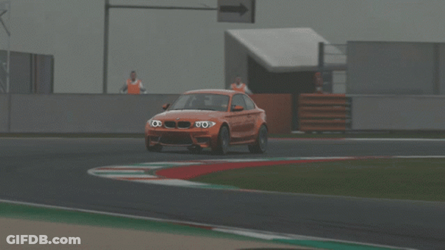Bmw M Series Driving Along Race Track GIF