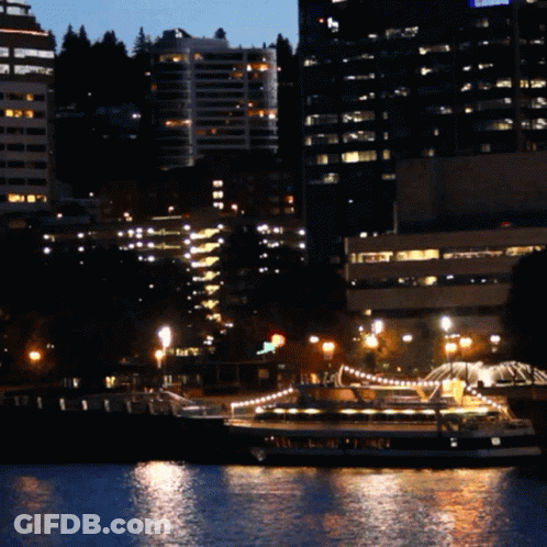 Boat Docked At Columbia Building GIF