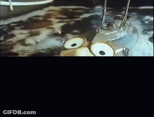Boat Floating On Water With City Background GIF
