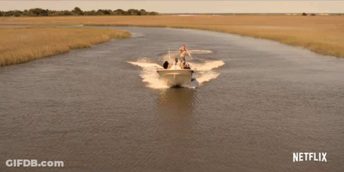 Boat Going Down River With Netflix Logo GIF