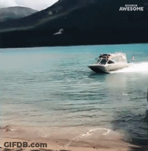Boat Going Through Water Saying Awesome GIF