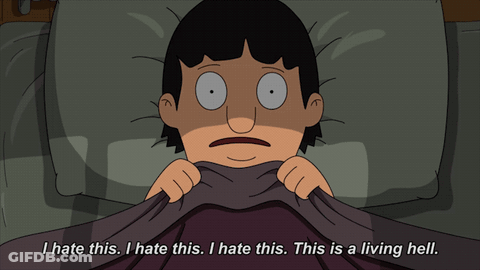 Bob From Bob 'S Burgers Is Laying In Bed With A Blanket Over His Head GIF