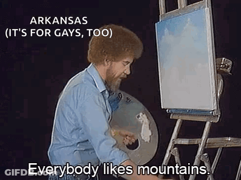 Bob Ross Painting On Easel Says Everybody Likes Mountains GIF