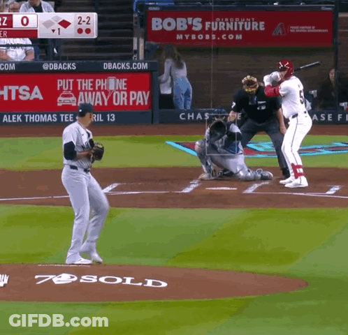 Bob's Furniture Ad Behind Baseball Player GIF