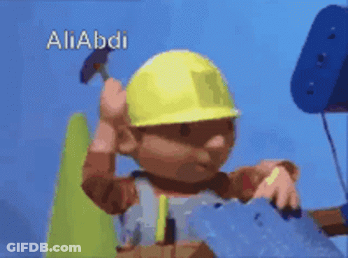 Bob The Builder Is Holding A Hammer And Wearing A Yellow Hard Hat GIF