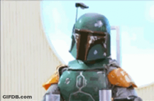 Boba Fett Is Standing In Front Of A Window Wearing A Helmet . GIF