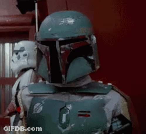 Boba Fett Is Wearing A Helmet And Standing Next To A Storm Trooper In A Room . GIF