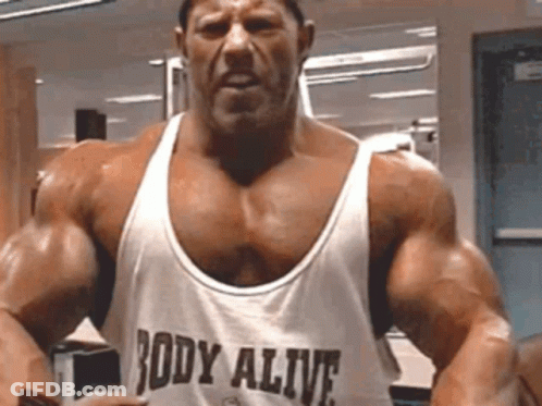 Bodybuilder In White Tank Top GIF