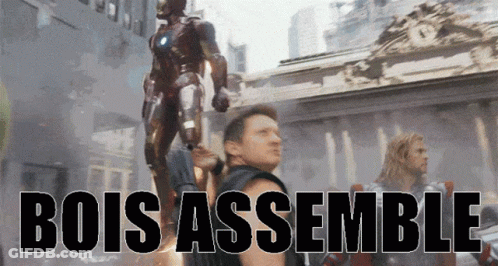 Bois Assemble Poster Man Next To Robot GIF