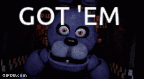 Bonnie From Five Nights At Freddy 'S Is Standing In The Dark With The Words Got ' Em Behind Him . GIF