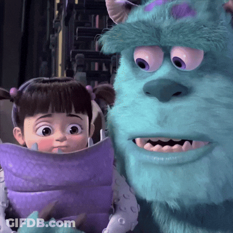 Boo And Sulley From Monsters Inc Are Standing Next To Each Other GIF