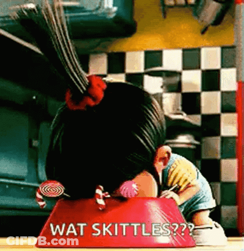 Boo Enjoys Skittles Candy GIF