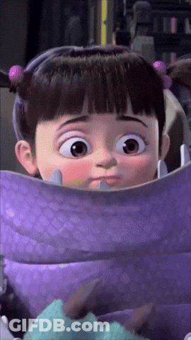 Boo From Monsters Inc Has A Purple Blanket Around Her Neck GIF