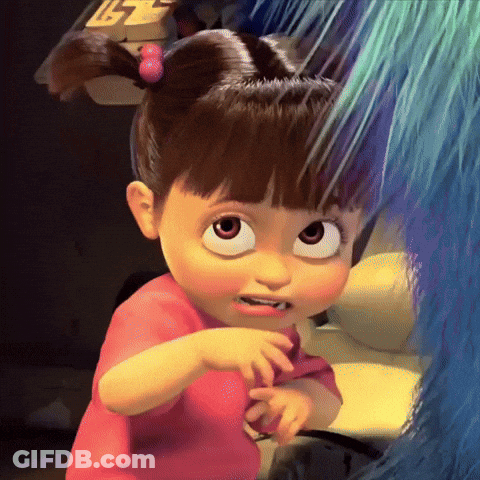 Boo From Monsters Inc Is A Little Girl With Big Eyes And A Pink Shirt GIF