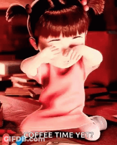 Boo From Monsters Inc Is Covering Her Mouth With Her Hands While Sitting On A Table . GIF