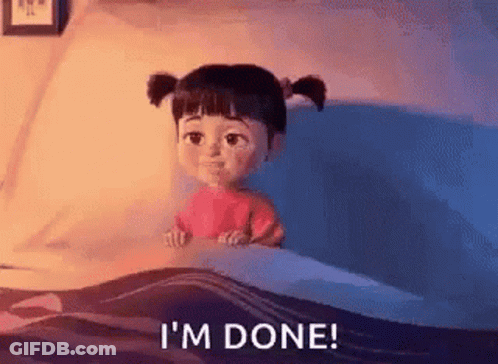 Boo From Monsters Inc Is Sitting In A Bed With The Words `` I 'M Done '' Written On The Bottom . GIF