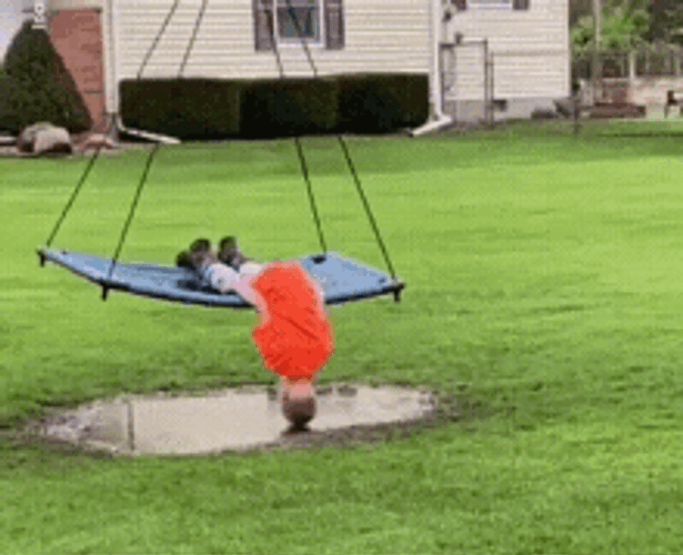 Bored Boy In The Swing GIF
