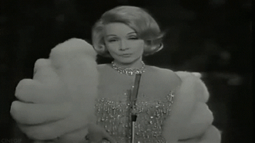 Bored Marlene Dietrich Smirking GIF