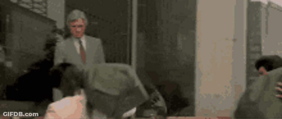 Boss Watching Men Carrying Money Bags GIF