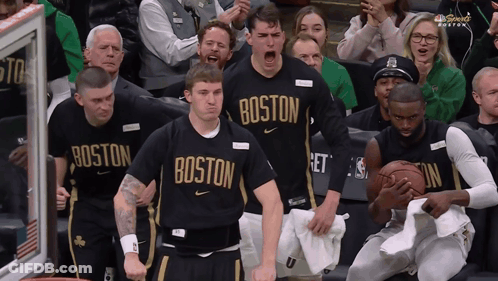 Boston Basketball Players Cheering In Front Of Crowd GIF