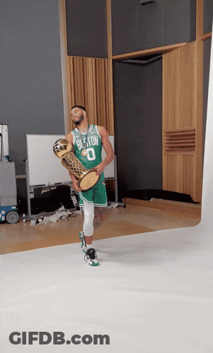 Boston Celtics Player Holding Trophy GIF