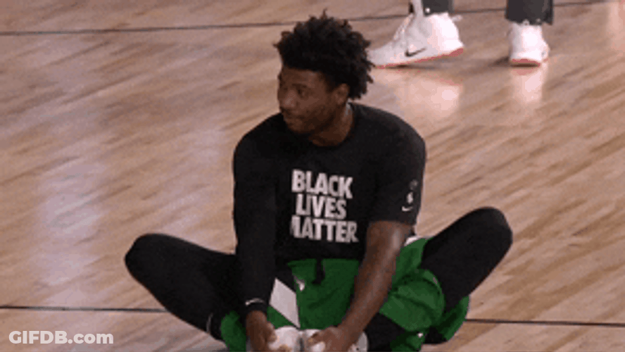 Boston Celtics Player Laughing While Stretching GIF