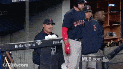Boston Red Sox Baseball Players Standing In A Dugout Sponsored By Bank Of America GIF