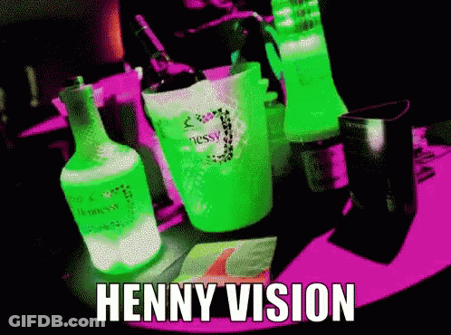 Bottle Of Hennessy Next To Green Cup GIF