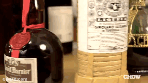 Bottle Of Liqueur Next To Ground Beef GIF