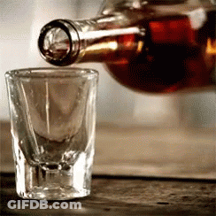 Bottle Of Liquor Poured Into Shot Glass GIF