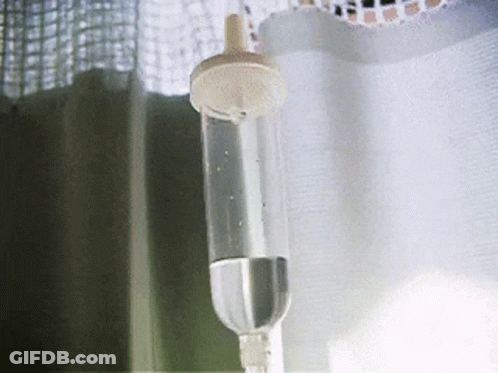 Bottle Of Water Hanging From Curtain GIF