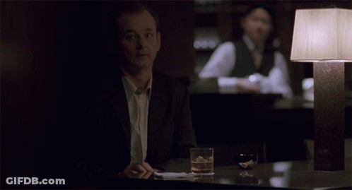 Bottle Of Wine On Pillow GIF