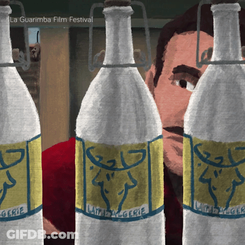 Bottles Of Lait De Algerie Lined Up GIF