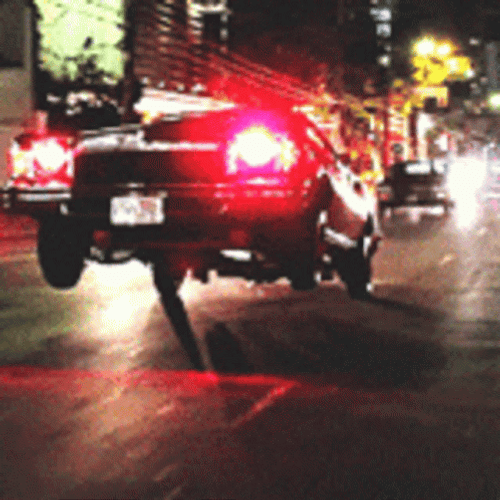 Bouncing Lowrider Car With Red Lights GIF