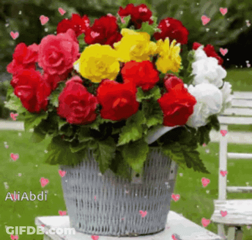Bouquet Of Colorful Flowers In A Basket GIF