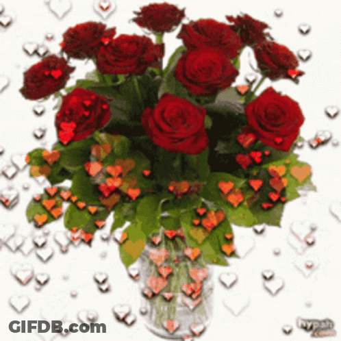 Bouquet Of Red Roses In Clear Vase GIF