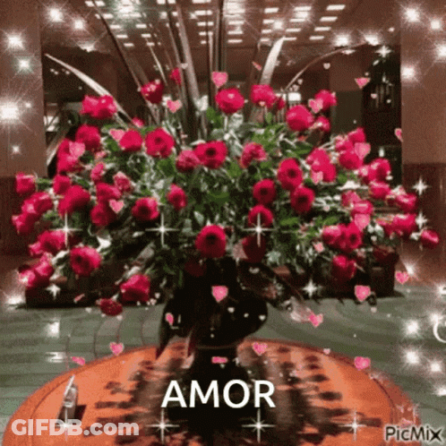 Bouquet Of Red Roses In Vase With Amor GIF