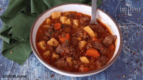 Bowl Of Beef Stew With Potatoes And Carrots GIF