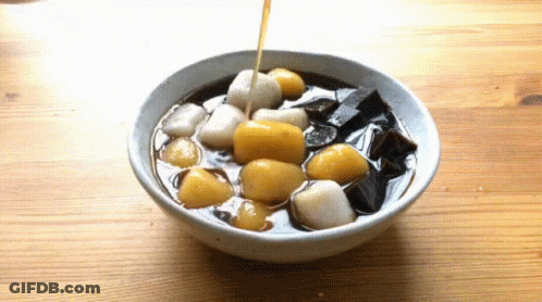 Bowl Of Food Being Poured Into Bowl GIF