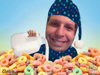 Bowl Of Honeycomb Cereal Next To Box GIF