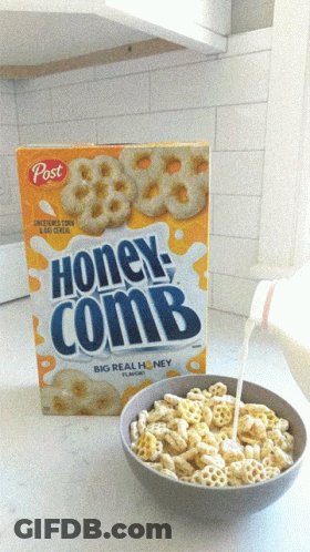 Bowl Of Honeycomb Cereal Next To Box GIF