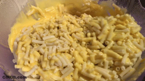 Bowl Of Macaroni And Cheese With Sauce GIF