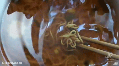 Bowl Of Noodles Stirred With Chopsticks E3 Live GIF