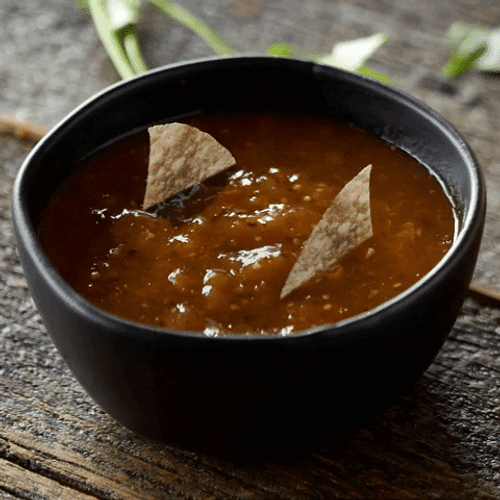 Bowl Of Salsa With Spinning Nachos GIF