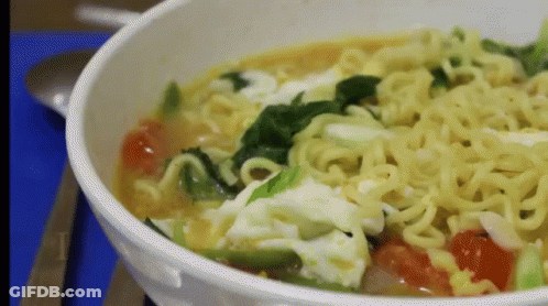 Bowl Of Soup With Noodles And Vegetables GIF