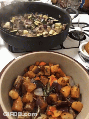 Bowl Of Vegetables Next To Pan GIF